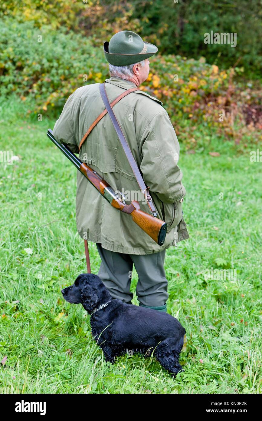 hunter with his dog hunting Stock Photo Alamy