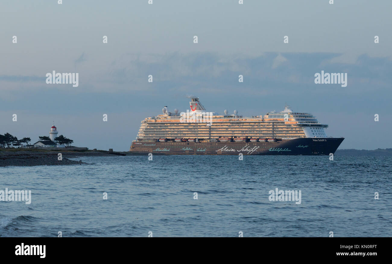 The cruise ship Mein Schiff 3 pass Sletterhage on its way to Aarhus Stock Photo