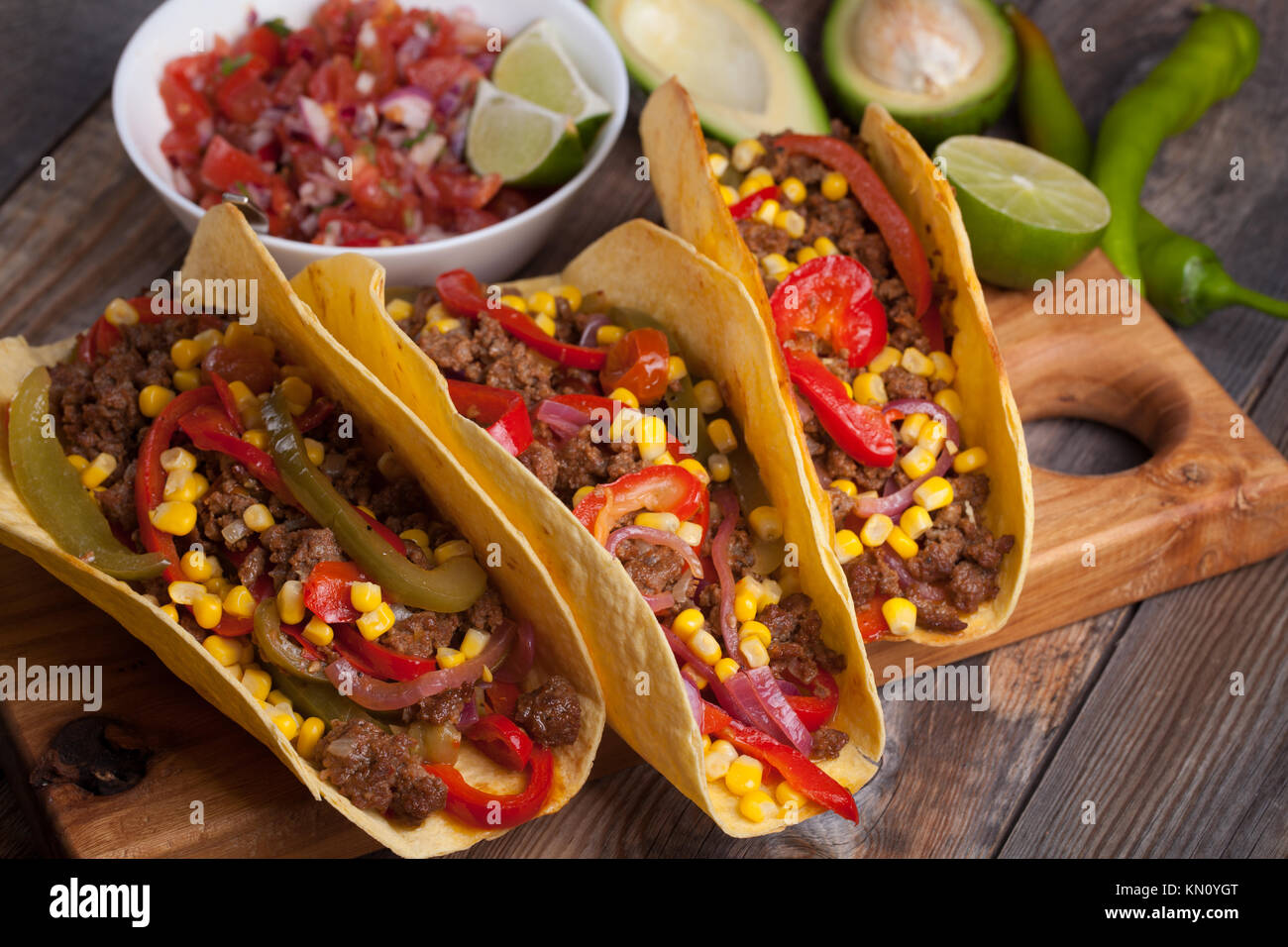 Mexican tacos with minced beef, vegetables and salsa. Tacos al pastor