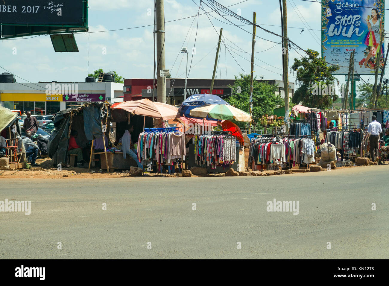 Roadside stalls selling clothes on display, Nairobi, Kenya, East Africa Stock Photo