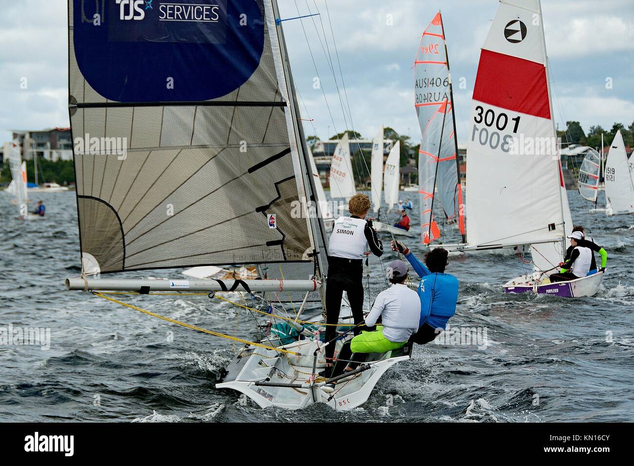 Children competing in the Australian Combined High School Sailing Championships 2013. Lake Macquarie. Australia. Young contestants raced in dinghies. Stock Photo