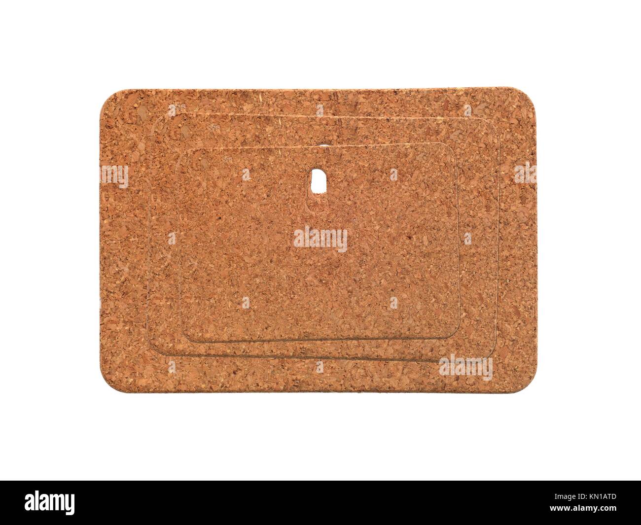 A cork board heat mats isolated against a white background Stock Photo