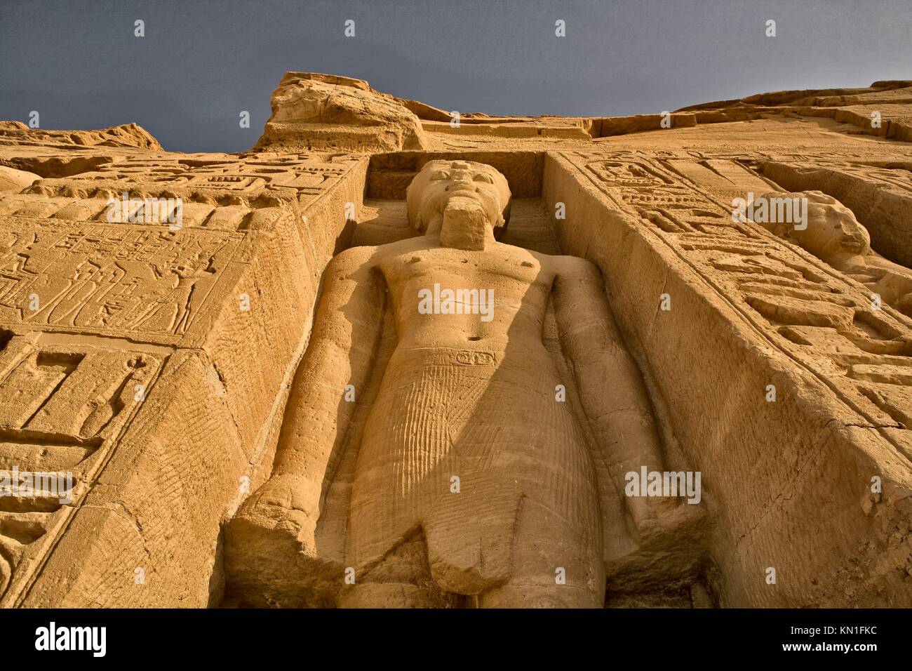 Hugh standing sculpture, high side of Temple of Queen Nefertari in Abu Simbel, Egypt Stock Photo