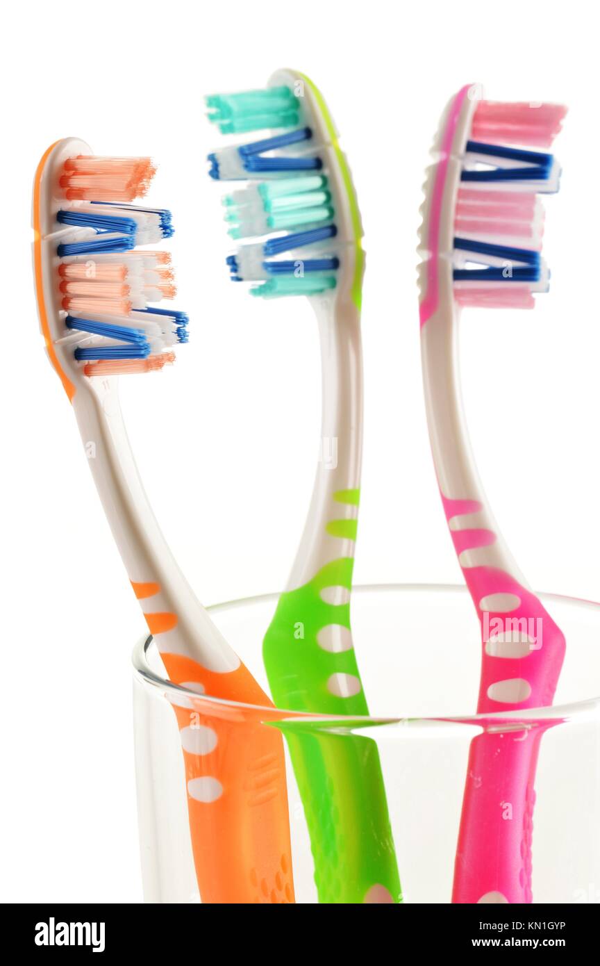 Composition with toothbrushes isolated on white background Stock Photo ...