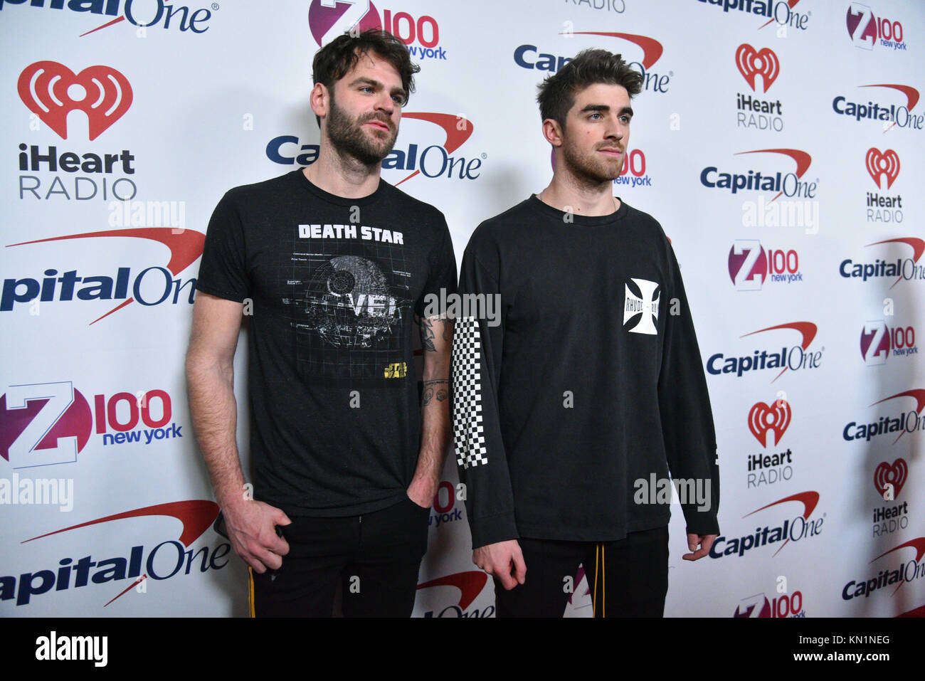 Andrew Taggart and Alex Pall of The Chainsmokers attend the Z100's Jingle Ball 2017 press room on December 8, 2017 in New York City. Stock Photo