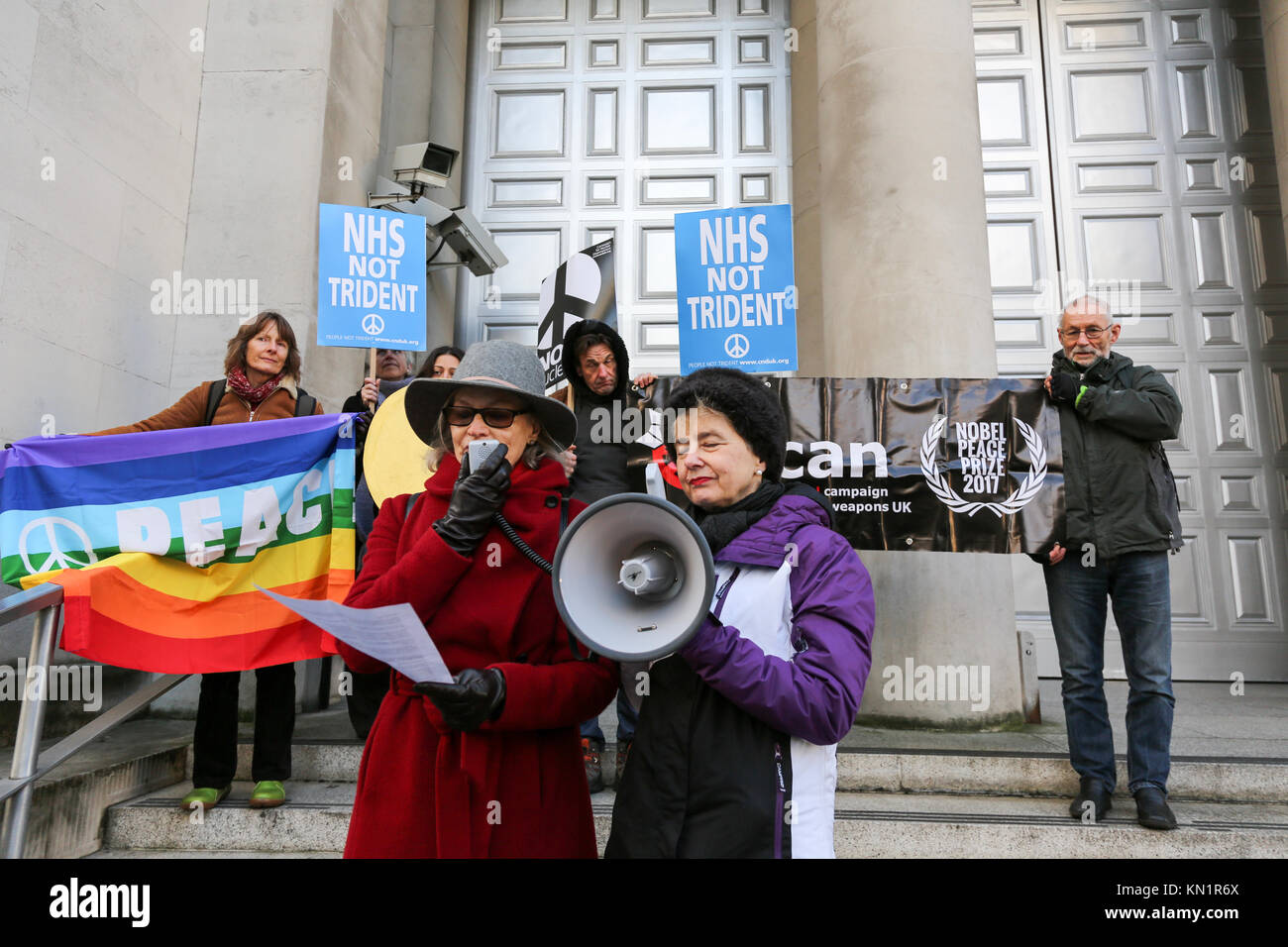 London, UK. 09th Dec, 2017. 9th Dec, 2017. ICAN UK, Medact and CND hold a die-in outside the Ministry of Defence, London, to draw attention to the indiscriminate nature of nuclear weapons. Penelope Barritt/Alamy Live News Credit: Penelope Barritt/Alamy Live News Stock Photo