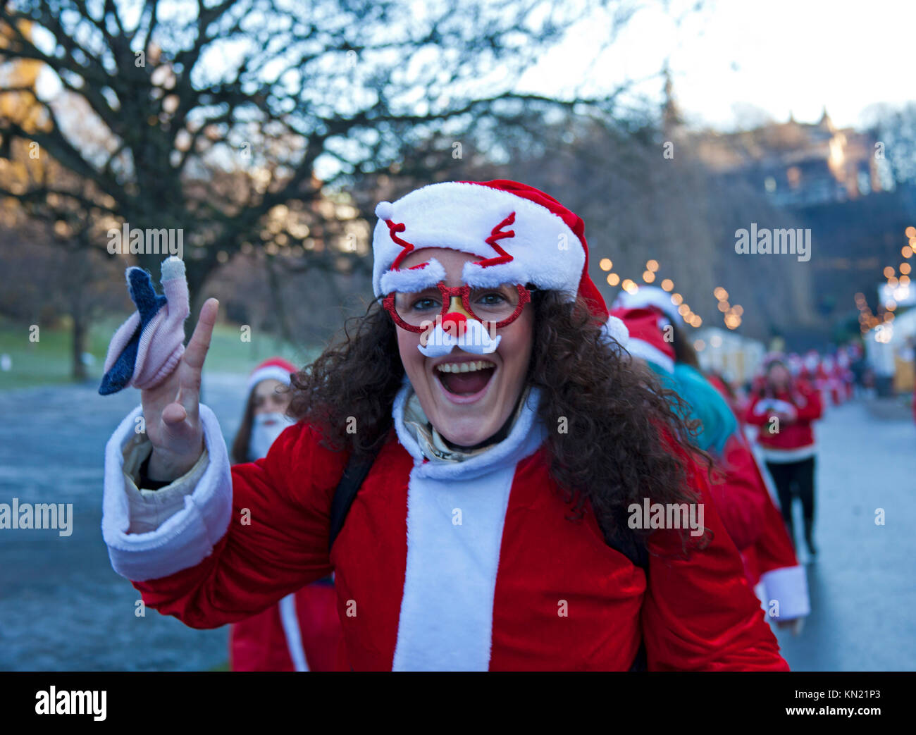 10 Dec. 2017. Edinburgh Santa Run, West Princes Street Gardens, Scotland,UK. Freezing conditions where the temperature dropped to minus six overnight. When you wish upon a star, dream making for sick children Stock Photo