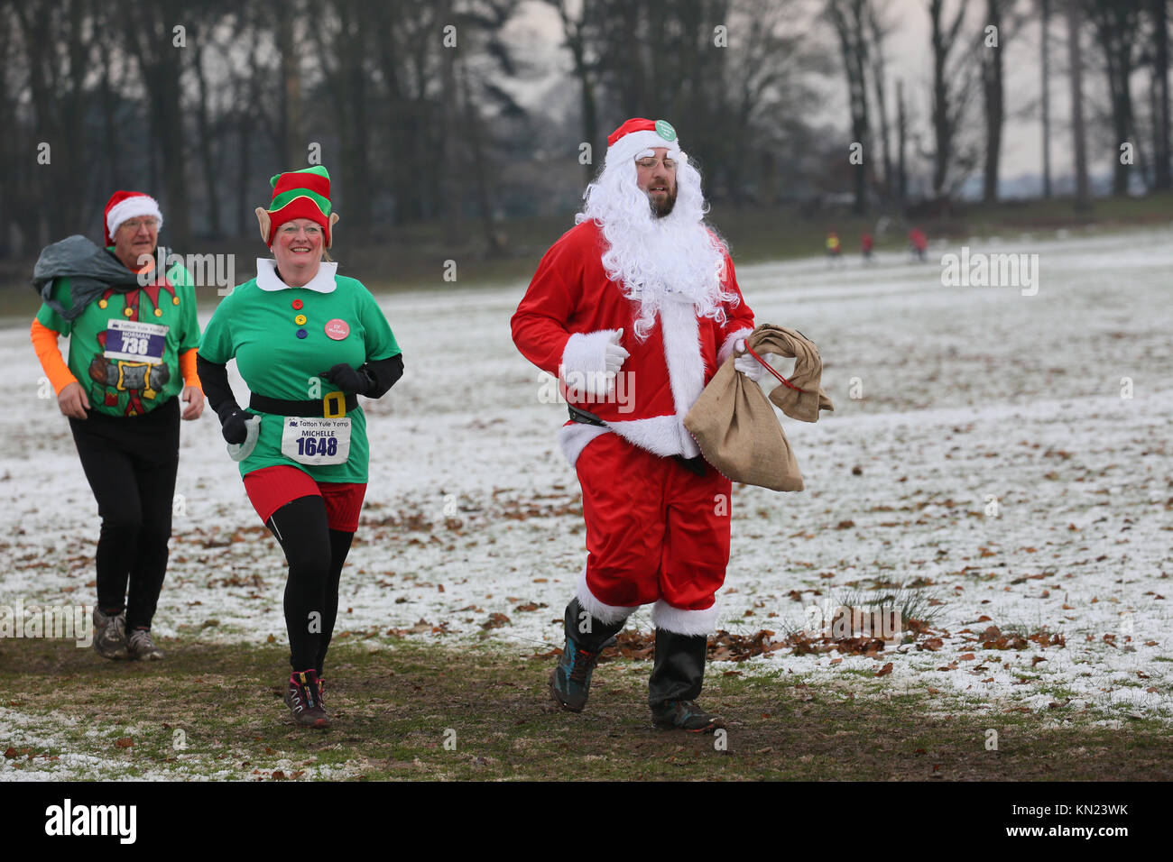 Knutsford, UK. 10th Dec, 2017. Santa and his Elf's costumes worn by