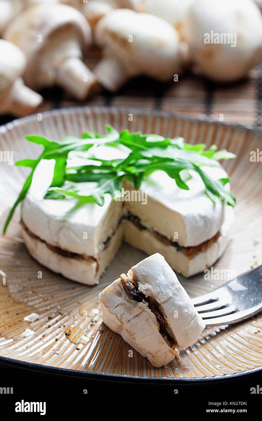 cheese brie filled with roasted mushrooms Stock Photo Alamy