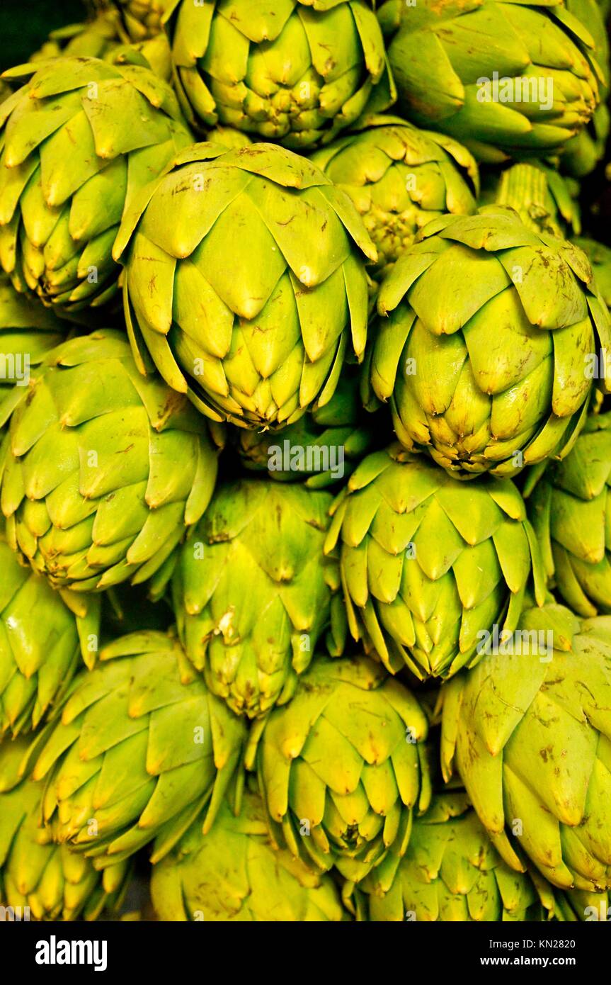 Lush green artichokes on display at a California farm stand, fresh from the fields in