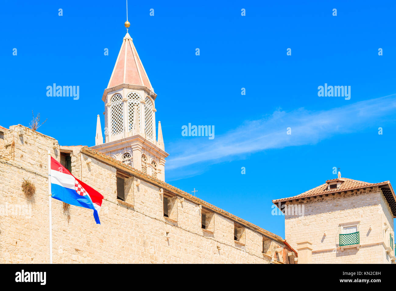 Church tower and Croatia flag in Trogir old town, Dalmatia, Croatia Stock Photo
