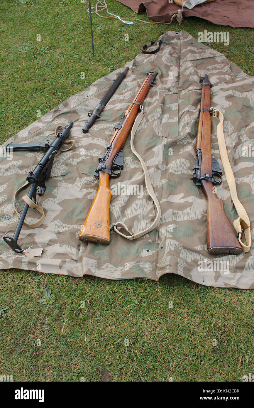 World war 2 era historical British army  small arms; Lee Enfield rifles and Sten sub-machine gun. Stock Photo