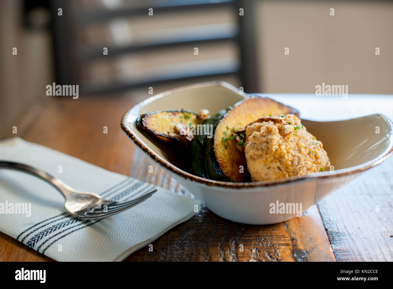 USA Virginia Williamsburg VA Culture Cafe serving fried mozzarella and acorn squash Stock Photo