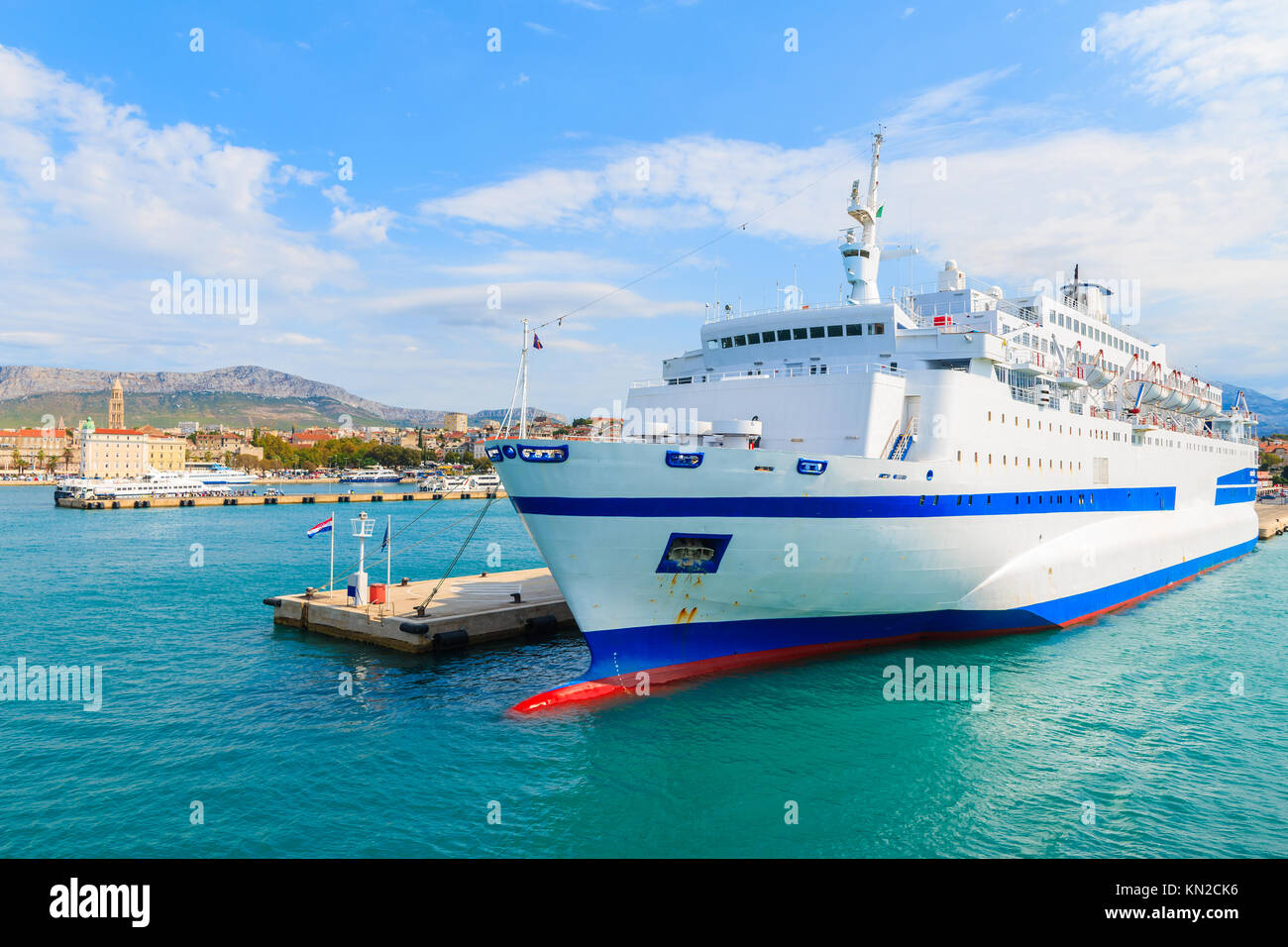 Large ferry ship carrying cars and passengers mooring in Split port, Croatia Stock Photo