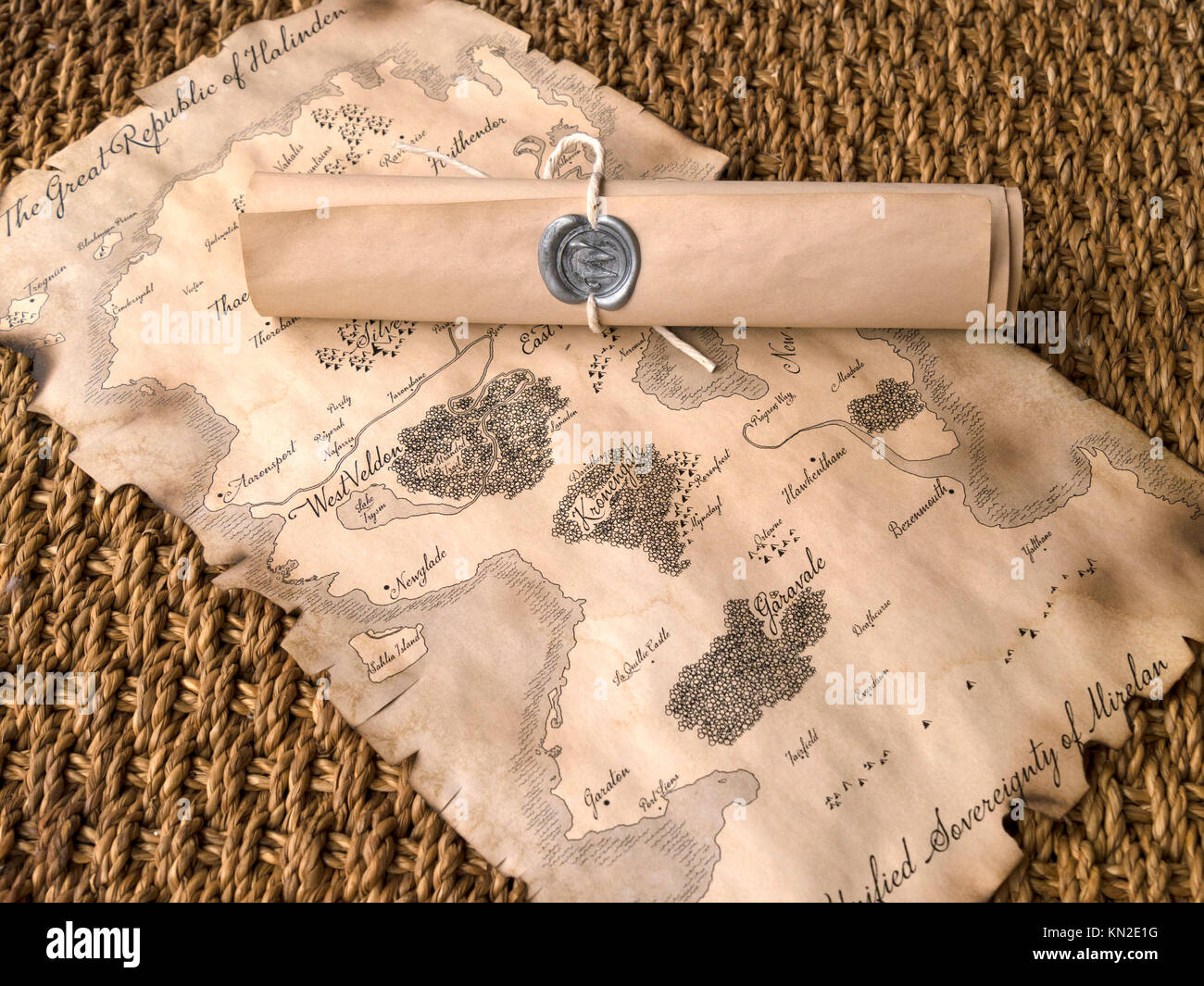 Fantasy roll playing game map with sealed scroll Stock Photo