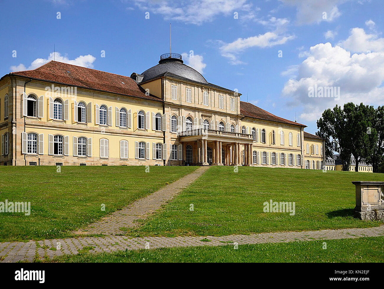 view of ancient baroque castle and his garden in surroundings of Stuttgart, now used as an university campus  Shot in bright summer light Stock Photo