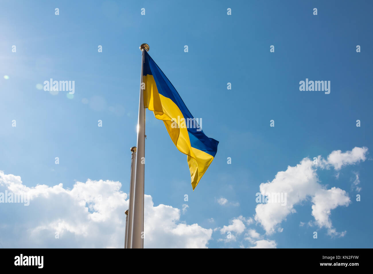 Ukrainian flag fluttering in the sky Stock Photo
