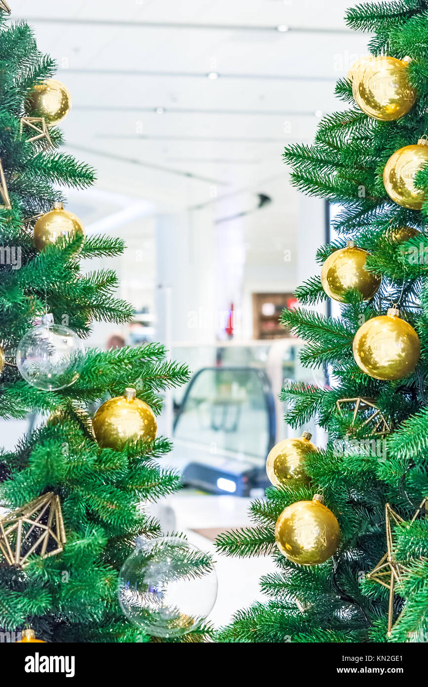 Christmas tree with gold decoration in shopping mall.Christmas
