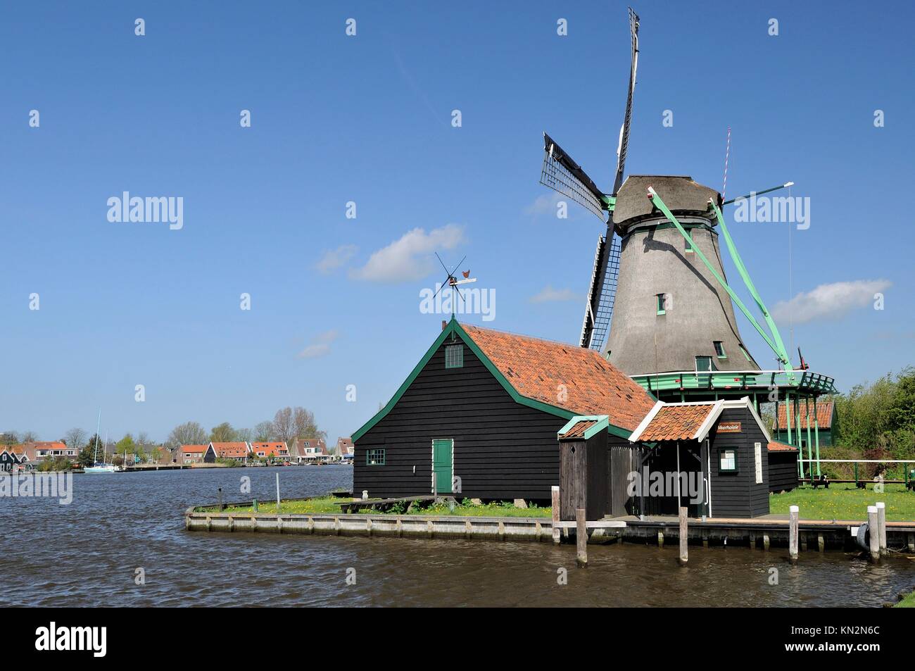 view of traditional windmill at touristic location, shot in bright spring light Stock Photo