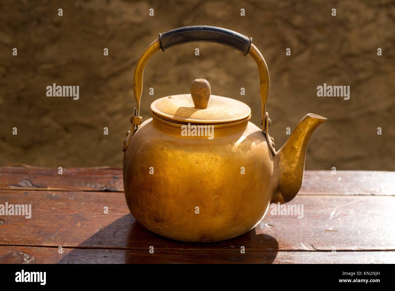 Antique brass teapot on vintage wooden aged table Stock Photo Alamy