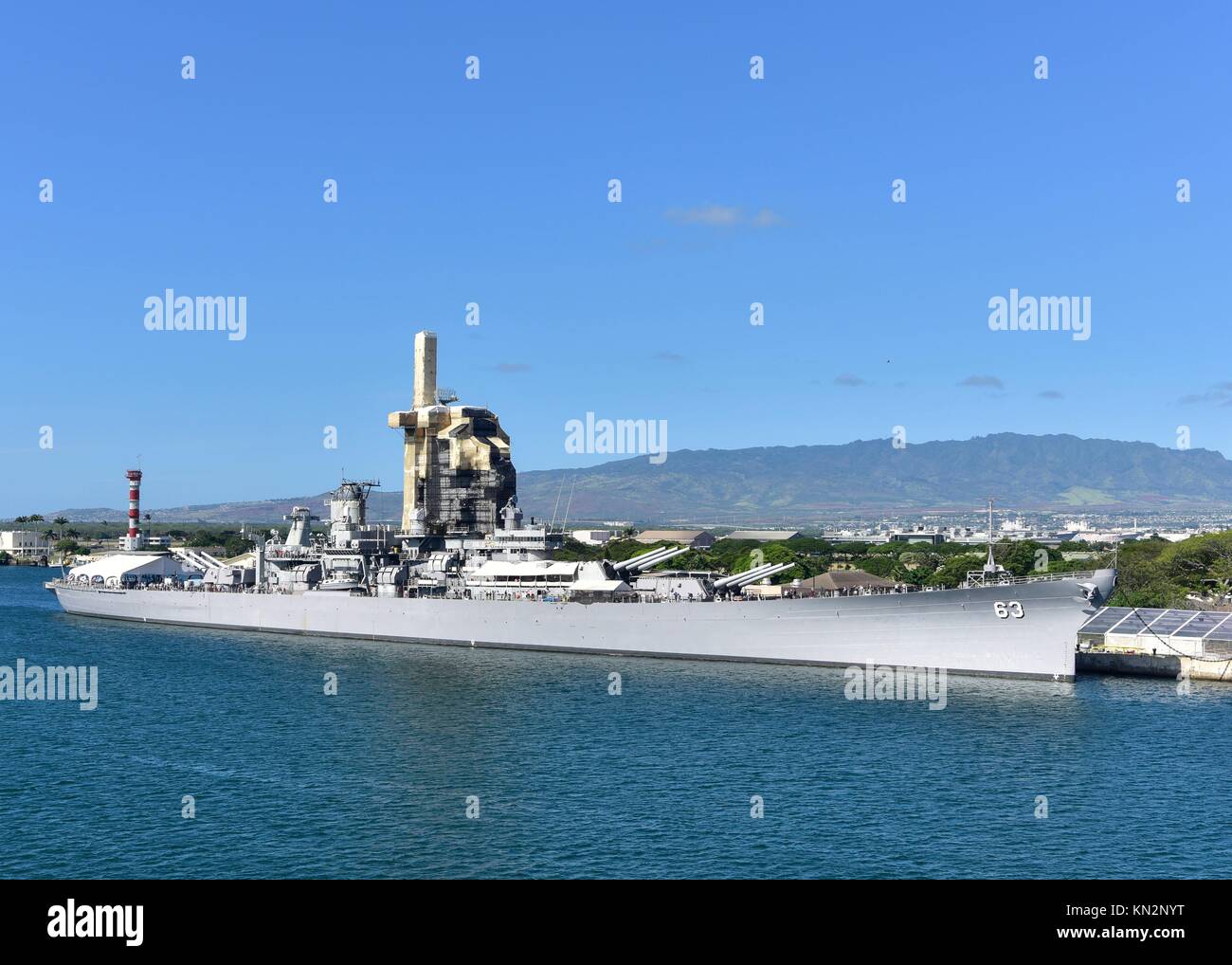 The U.S. Navy Nimitz-class aircraft carrier USS Nimitz passes the USS Battleship Missouri Memorial as it departs the Joint Base Pearl Harbor-Hickam November 29, 2017 in Pearl Harbor, Hawaii.  (photo by Emily Johnston via Planetpix) Stock Photo