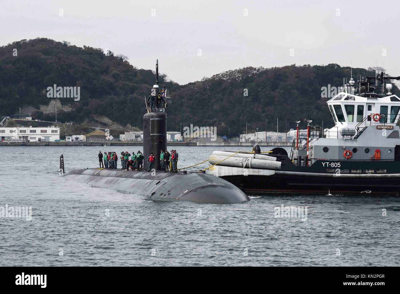 The U.S. Navy Los Angeles-class fast-attack submarine USS Tucson arrives at Fleet Activities Yokosuka for a port visit December 1, 2017 in Yokosuka, Japan.  (photo by Brian G. Reynolds via Planetpix) Stock Photo