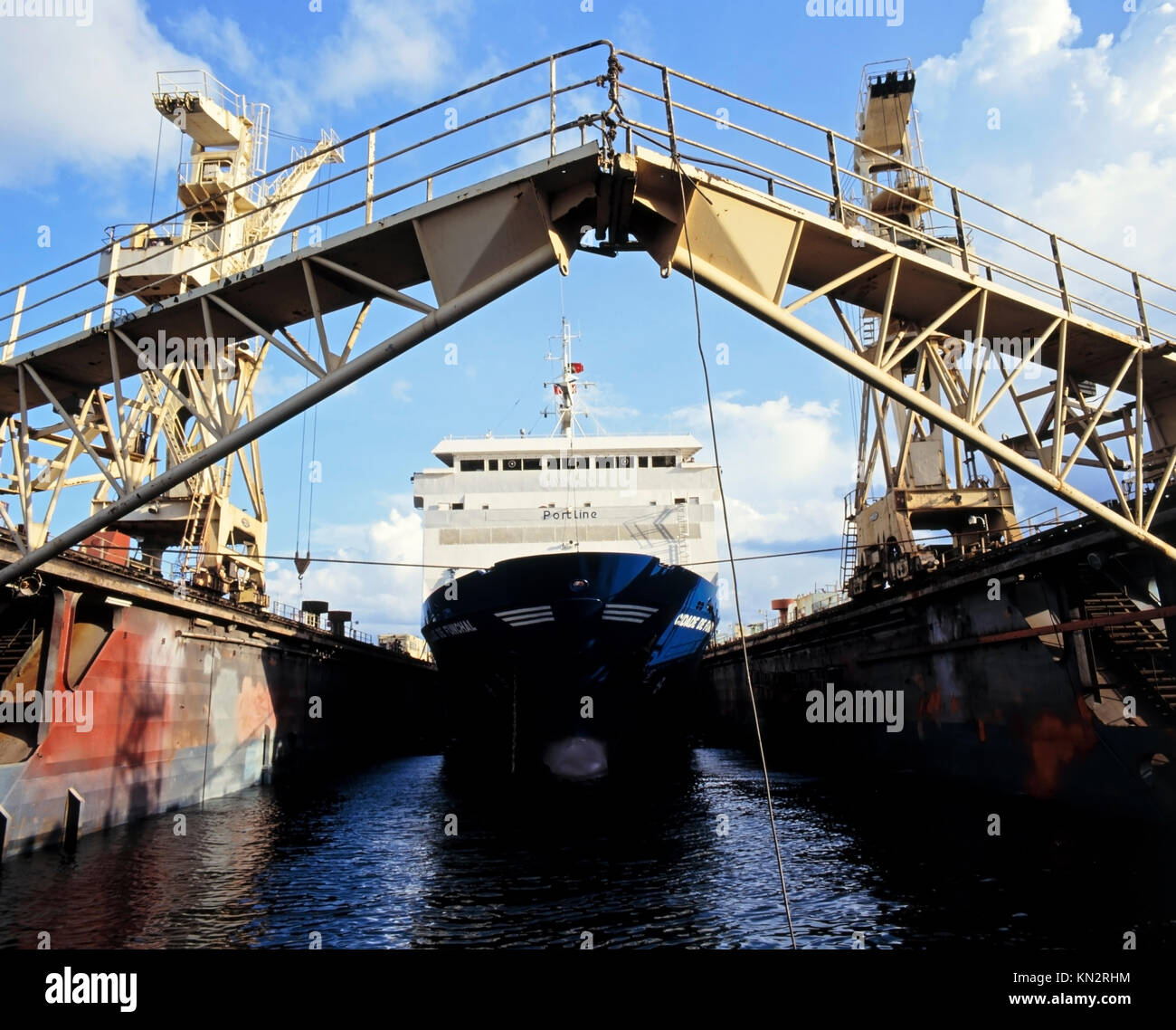 Ship being floated in a floating drydock Stock Photo
