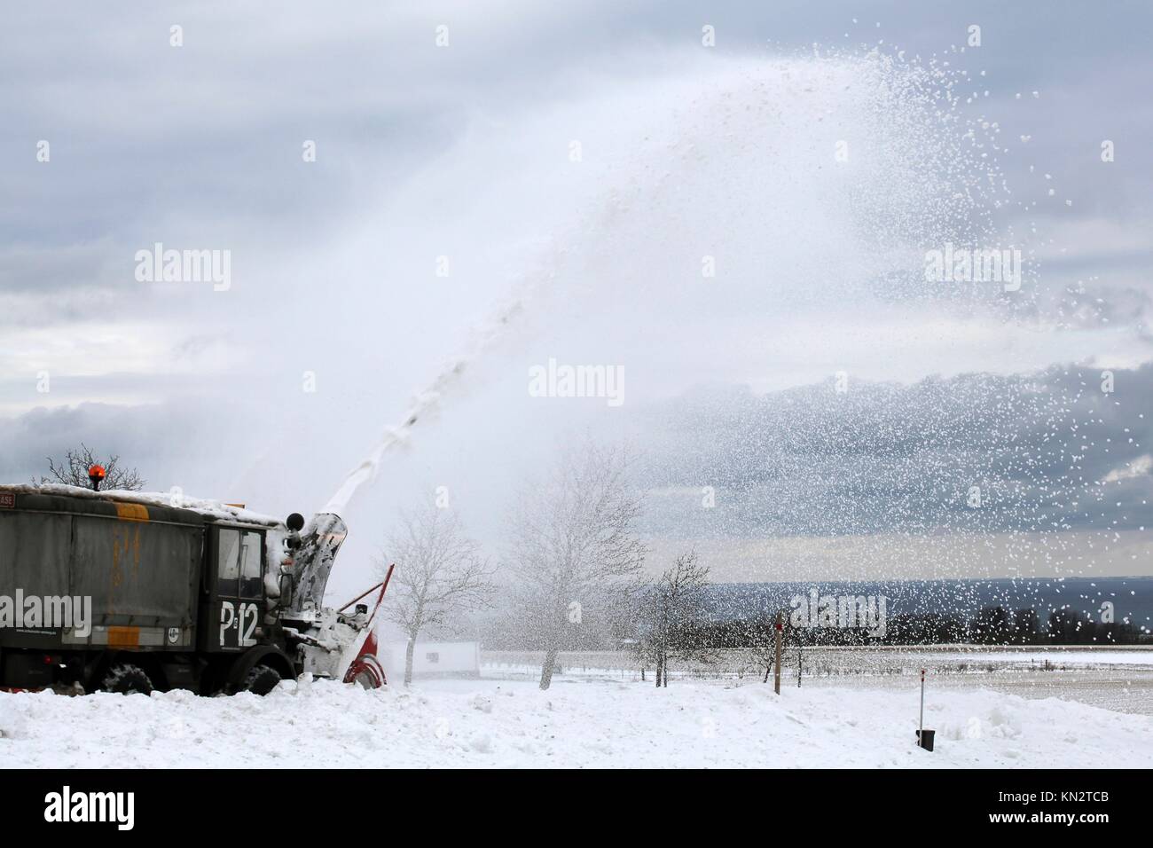 Highspraying snowblower at work. Scandinavia Stock Photo Alamy