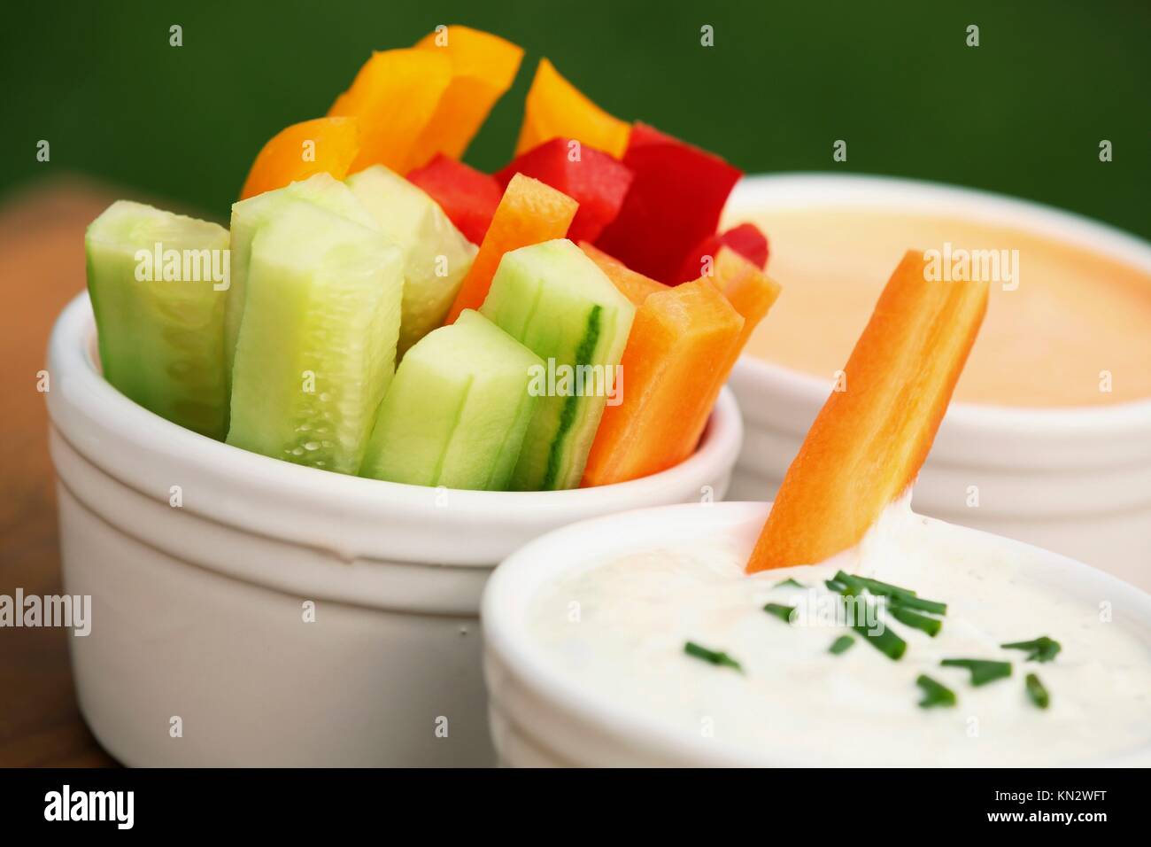 Vegetable sticks and dips in bowls Stock Photo Alamy