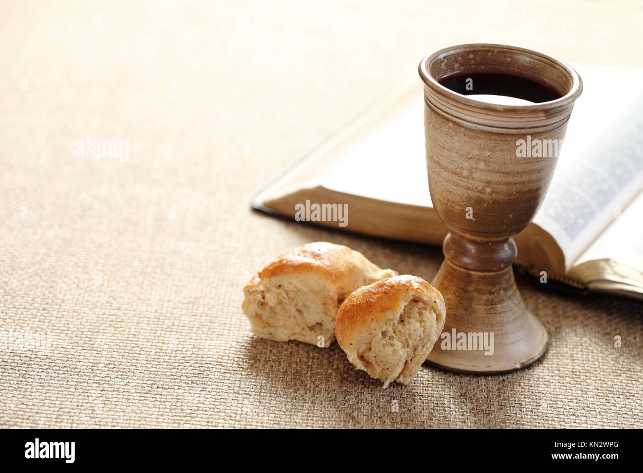 Communion still life wine, bread and Bible Stock Photo Alamy