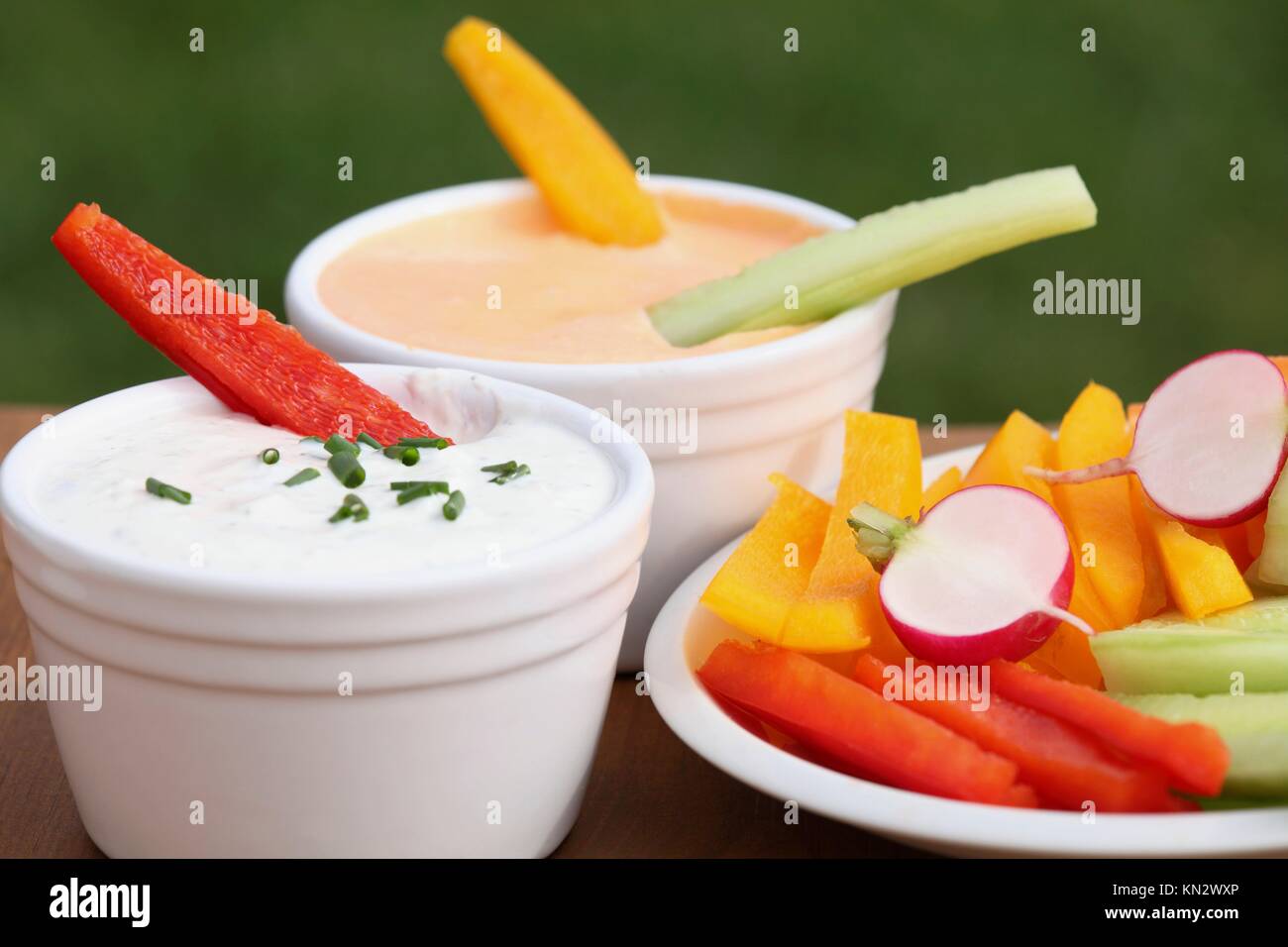Vegetable sticks and dips in bowls Stock Photo Alamy