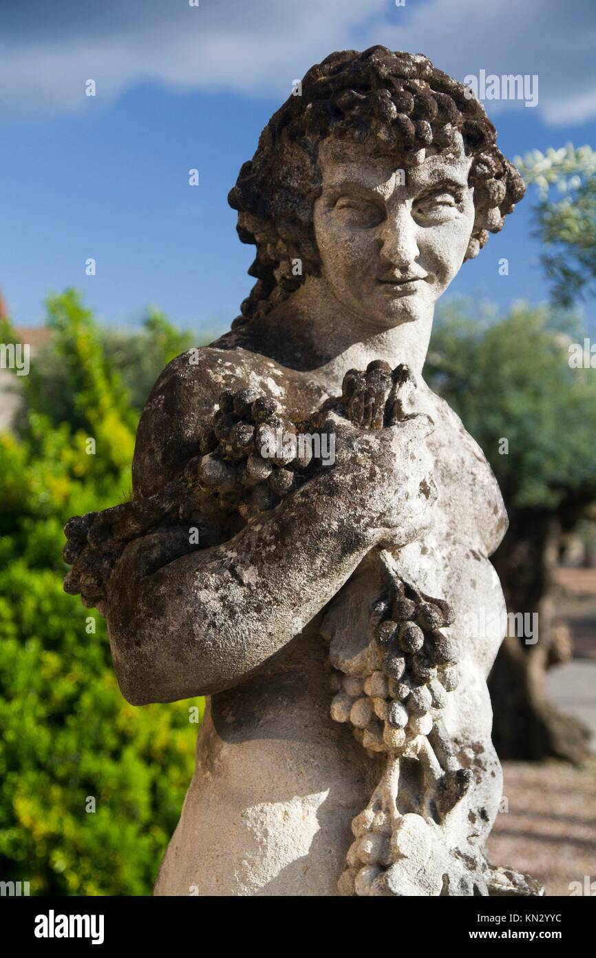 View of a stone statue representing the Greek God of wine, Dionysus