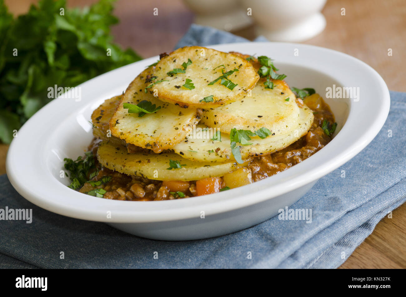 Minced lamb, chunky carrots and peas in a rich gravy, topped with