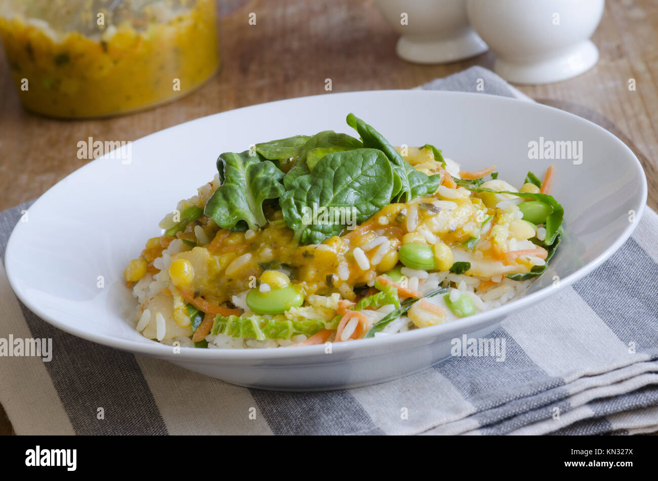Thai coconut curry with edamame beans, rice and lemongrass Stock Photo