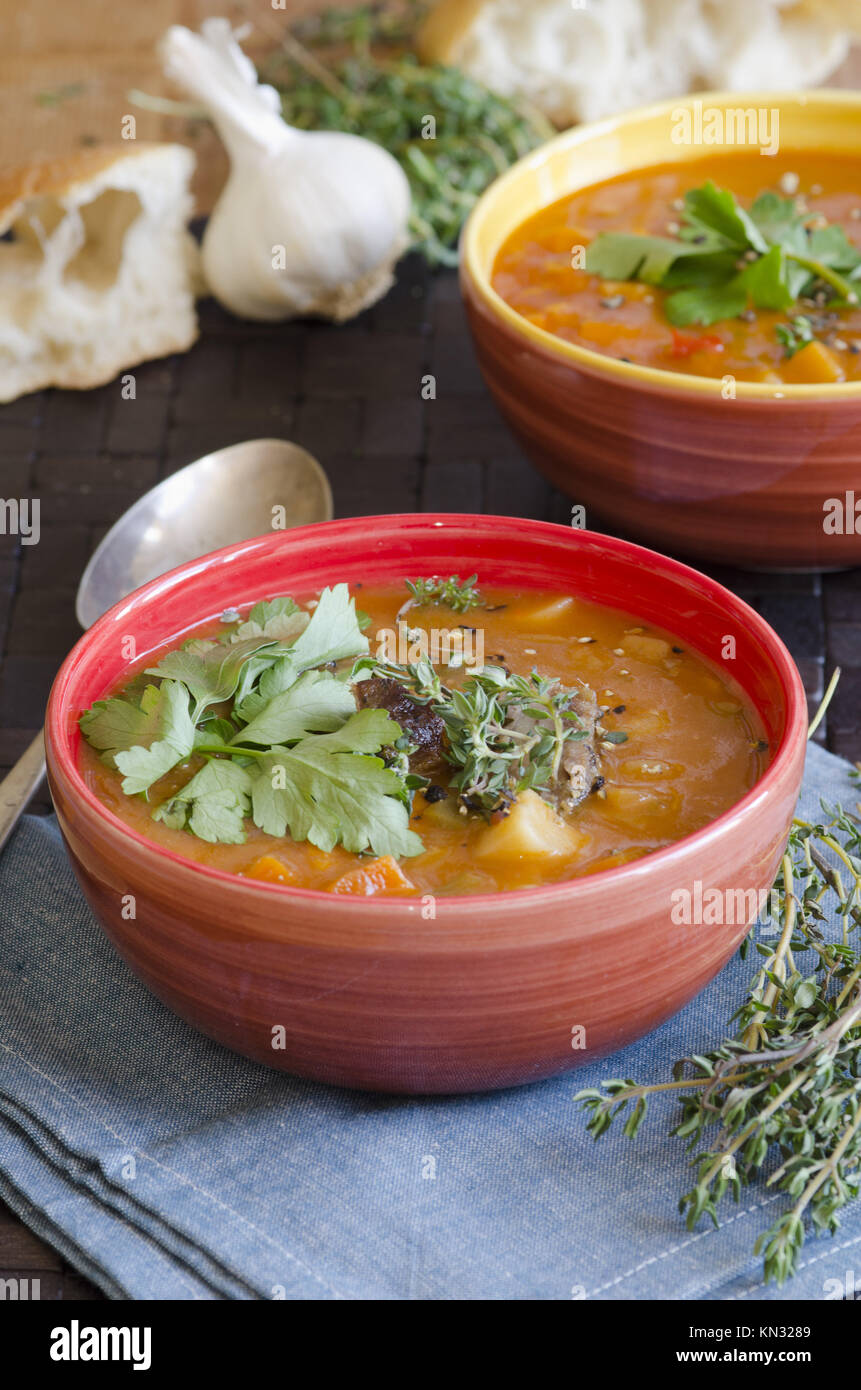 Slowcooked lamb and root vegetable soup Stock Photo Alamy