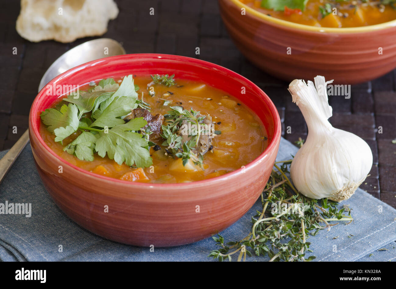 Slow-cooked lamb and root vegetable soup. Stock Photo