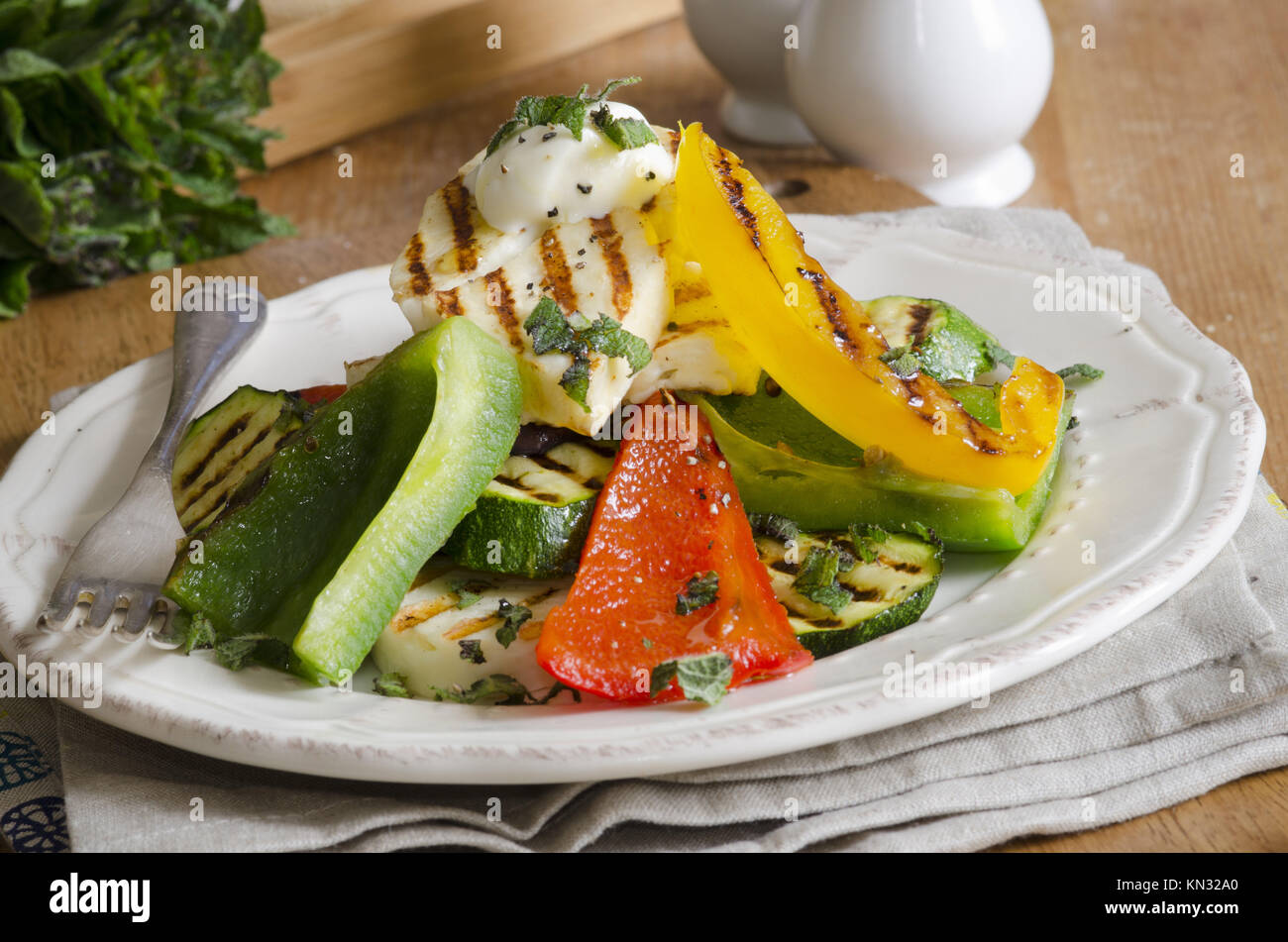 Roasted vegetables topped with griddled Halloumi cheese Stock Photo Alamy