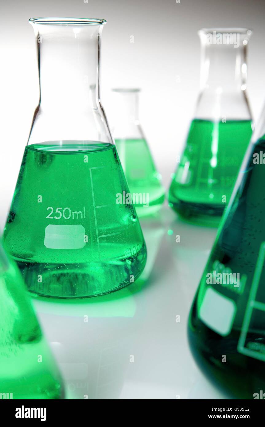 group of laboratory flasks containing liquid color Stock Photo Alamy