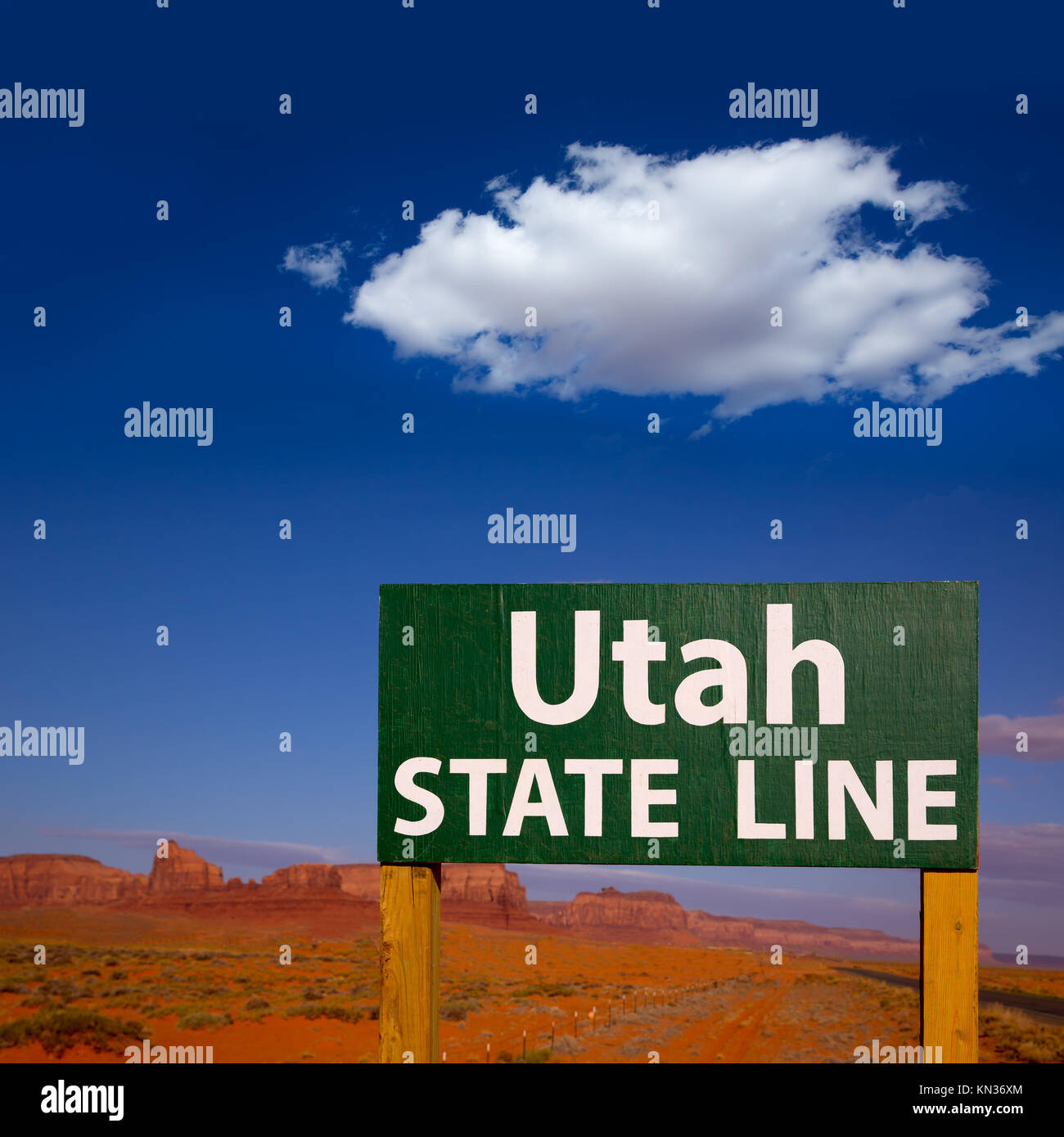 Road sign between Utah and Arizona State Line in Monument Valley Stock