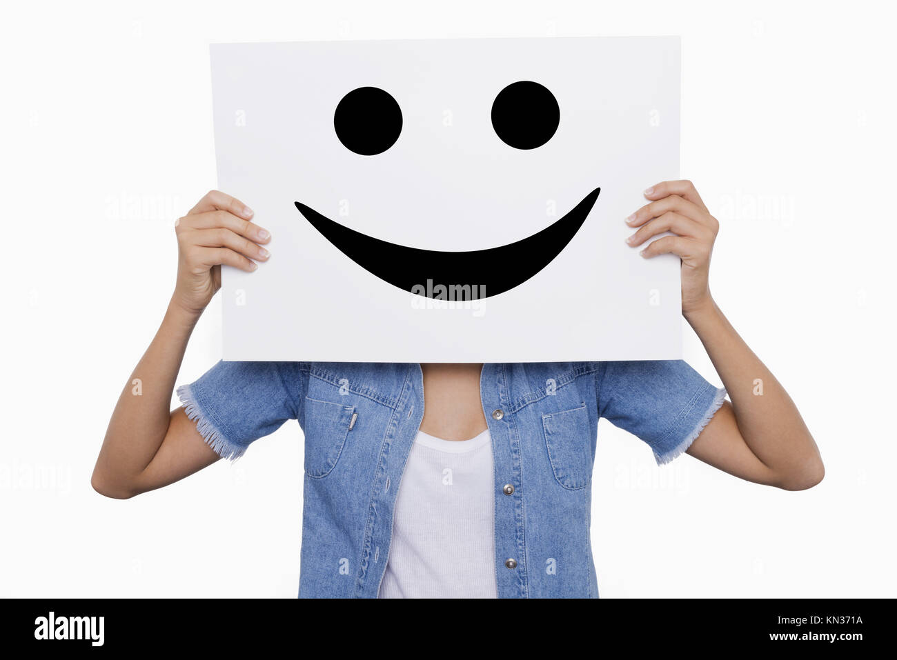 Blonde Girl Holding A Placard With A Smiling Smiles Front Of Her Face Stock  Photo - Alamy