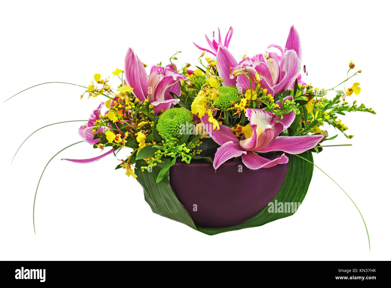 Bouquet from orchids and lilies in vase isolated on white background