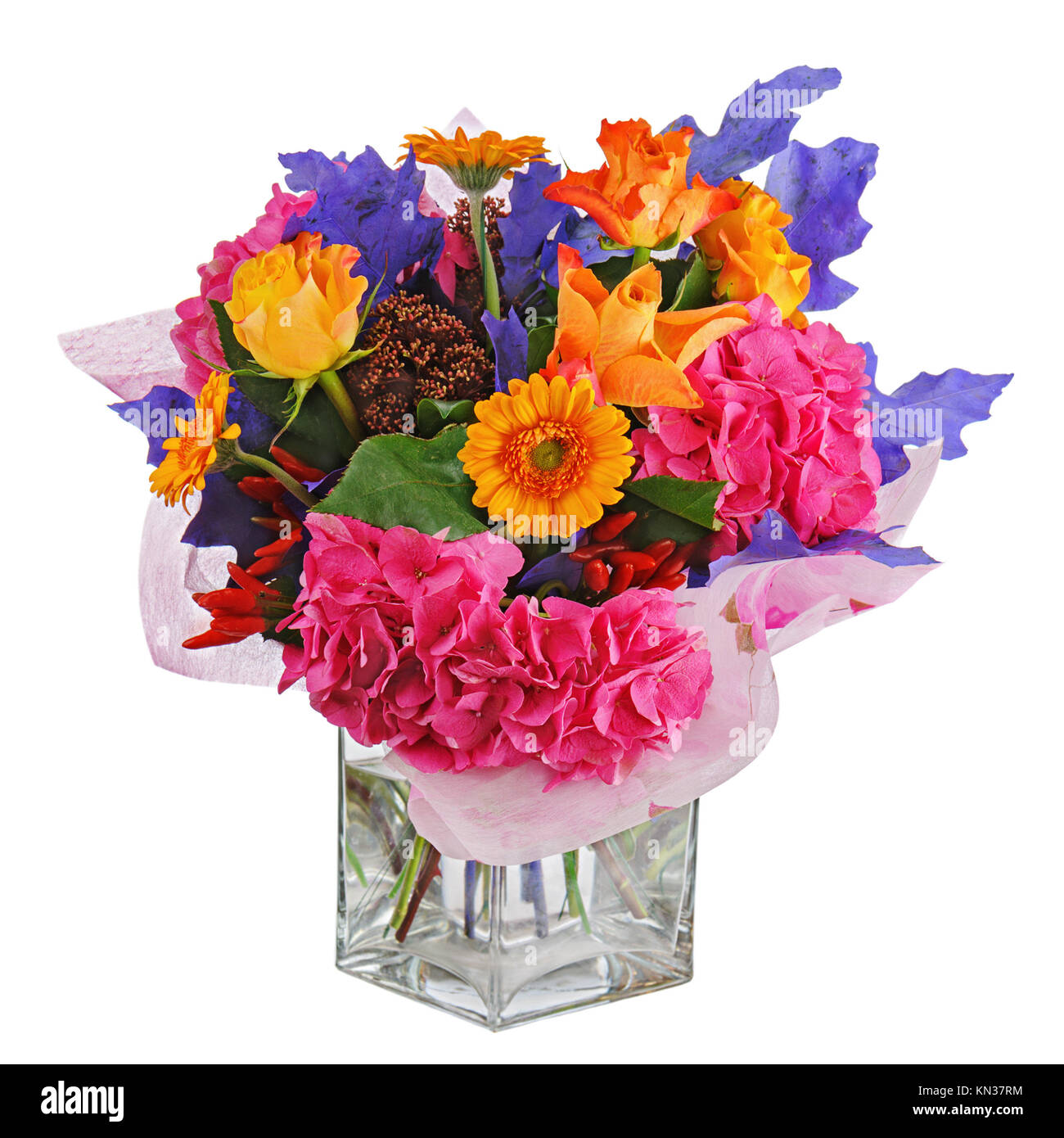 Colorful flower bouquet in vase isolated on white background. Closeup