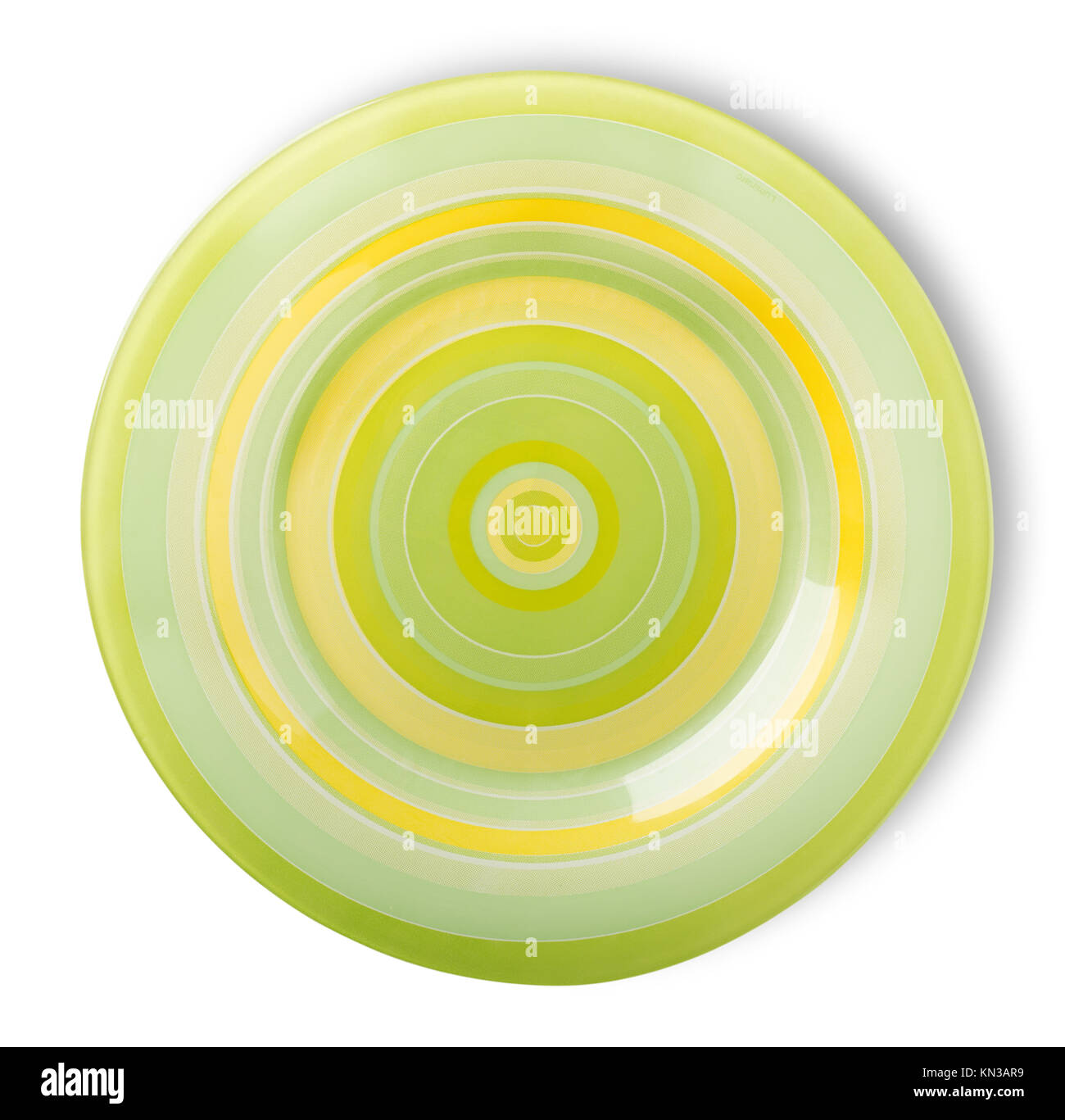 Green plate isolated on a white background Stock Photo - Alamy