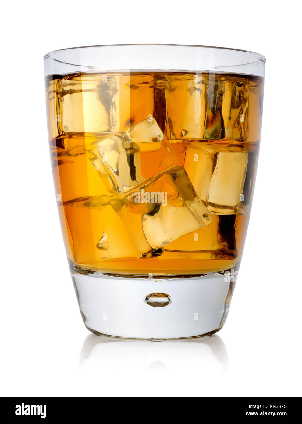 Brandy glass with brandy and ice isolated on a white background Stock