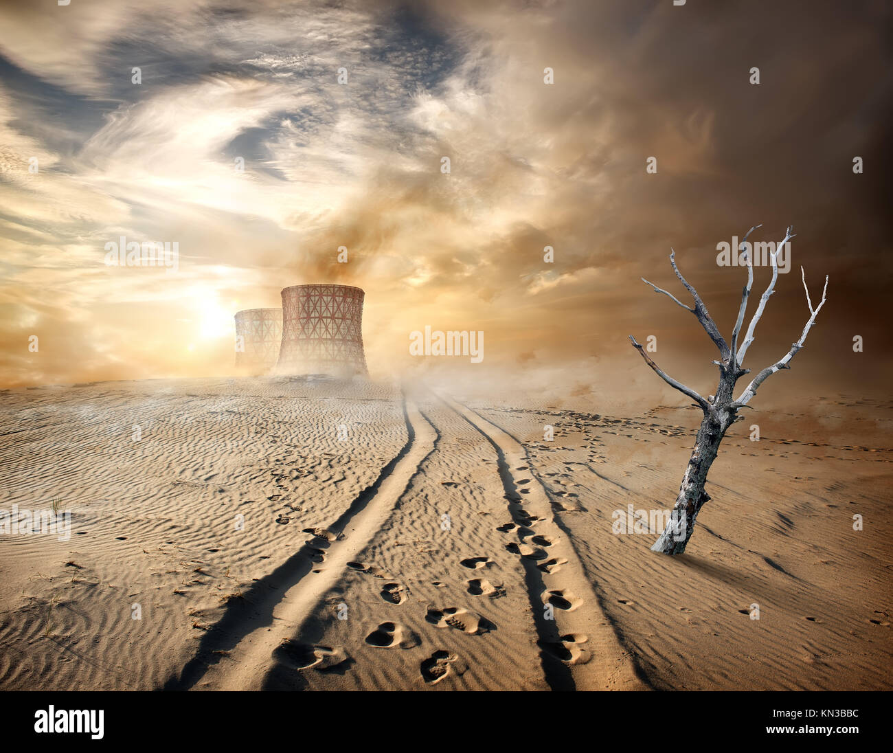 Industrial pipes and dry tree in desert. Stock Photo