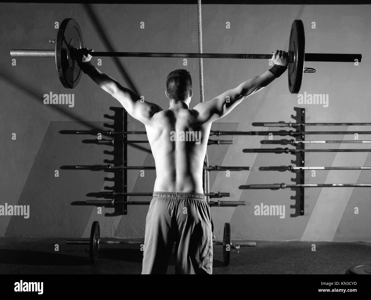 barbell weight lifting man rear view back workout exercise at gym box Stock Photo Alamy