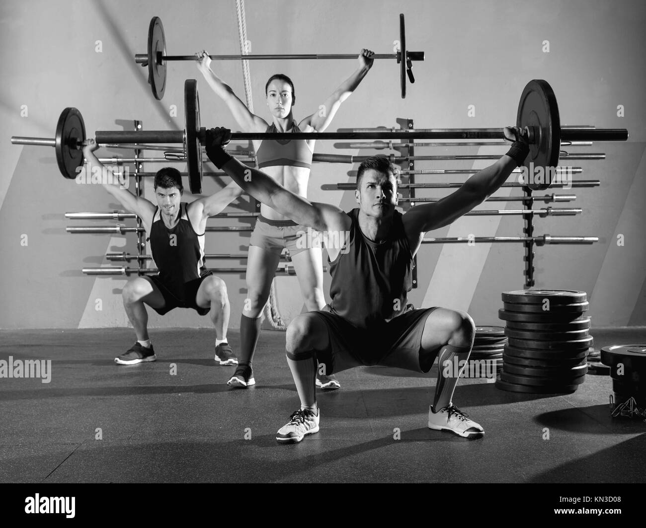 Young woman lifting heavy box Black and White Stock Photos & Images Alamy