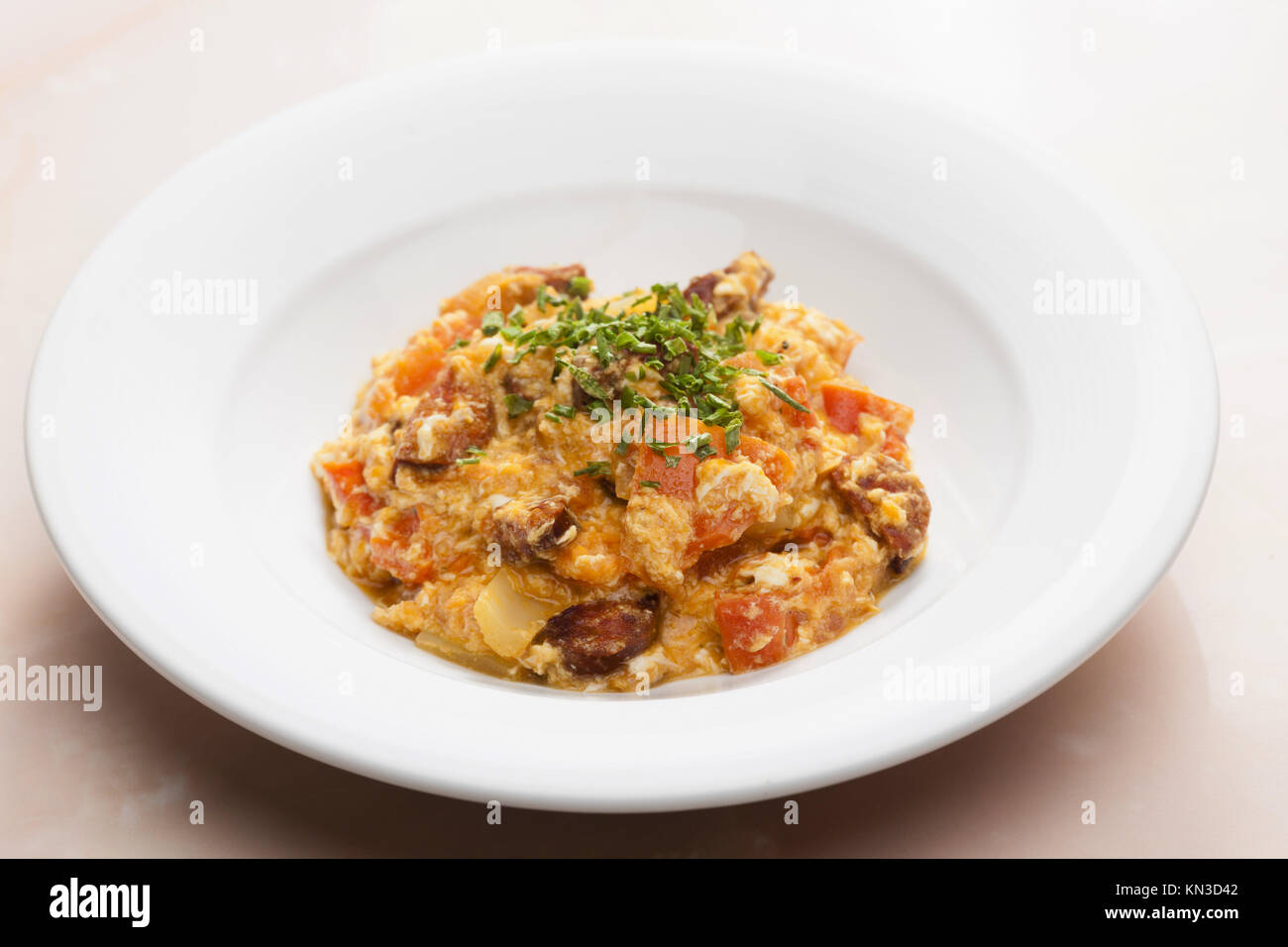 meal called leco (mixture of vegetables and eggs with sausage). Stock Photo