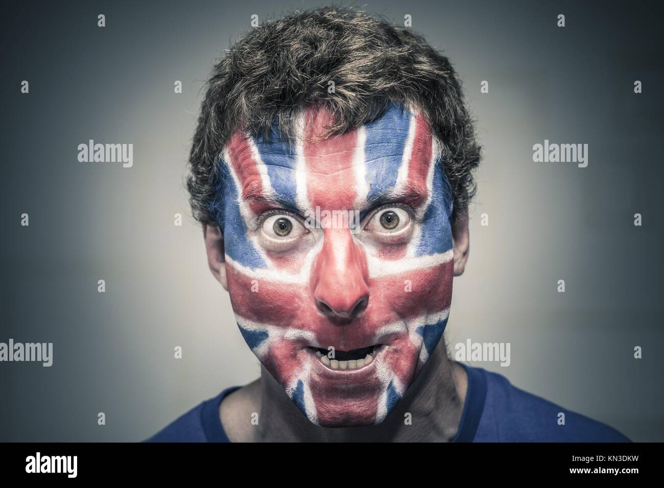 Dark Man With White Face Paint Stock Photo - Download Image Now