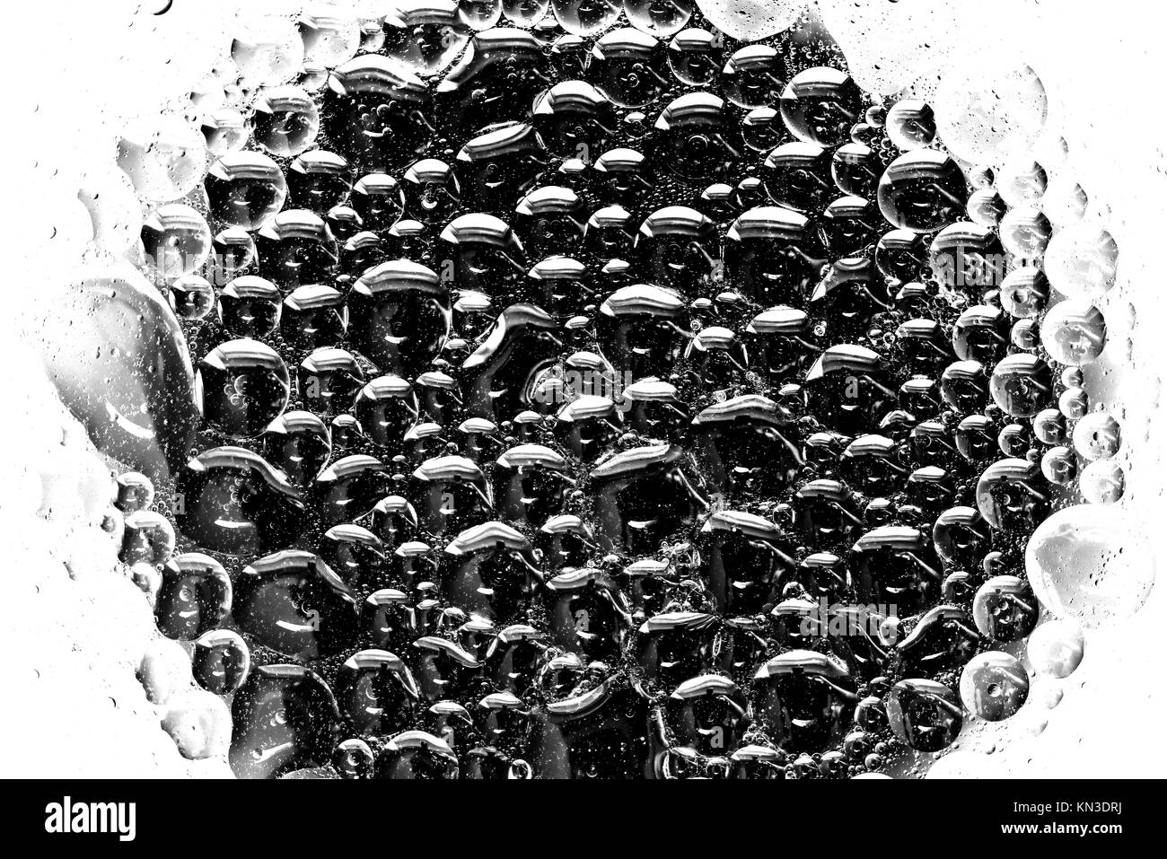 Oil in water emulsion Black and White Stock Photos & Images - Alamy